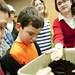 Cam Herkimer, 9, looks at a red wiggler worm at Sara Whyberk's presentation during the Southeastern Michigan Science Fair in the Morris Lawrence building at Washtenaw Community College on Saturday, March 9. Daniel Brenner I AnnArbor.com